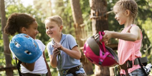 courageous-children-having-fun-adventure-park